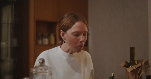 Woman with pleasure eats dinner, happily communicating celebrating Thanksgiving — Stock Video