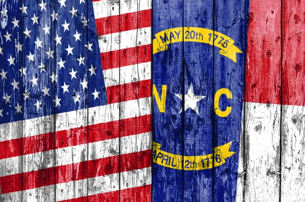 Flag of US and North Carolina painted on wooden frame — Stock Photo, Image