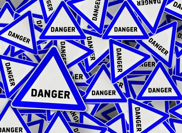 A lot of danger on blue triangle road sign — Stock Photo, Image