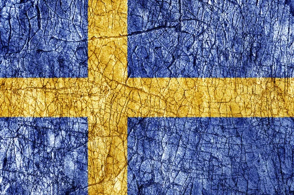 Groll Stein bemalte schwedische Flagge — Stockfoto