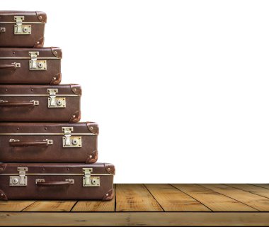 Beyaz arka plan ile ahşap tahta üzerinde Vintage çanta