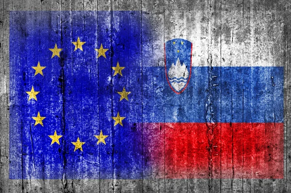 Прапор Словенії та ЄС на бетонну стіну — стокове фото