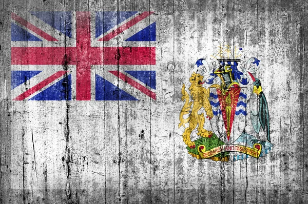 콘크리트 벽에 영국 남극 영토의 깃발 — 스톡 사진