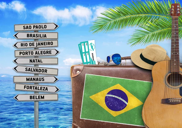 Concept of summer traveling with old suitcase and Brazil town sign — Stock Photo, Image