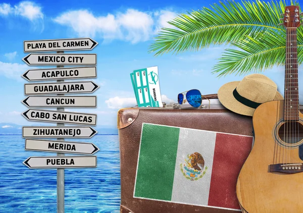 Concept of summer traveling with old suitcase and Mexico town sign — Stock Photo, Image