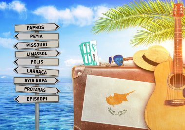 Concept of summer traveling with old suitcase and Cyprus with burning sun clipart