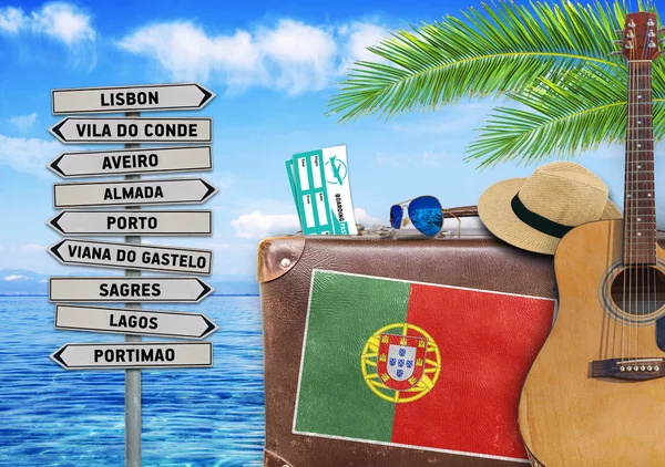 Concept of summer traveling with old suitcase and Portugal — Stock Photo, Image