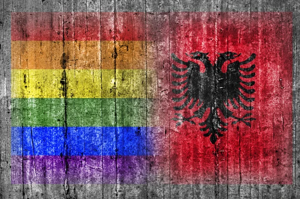 LGBT and Albania flag on concrete wall — Stock Photo, Image