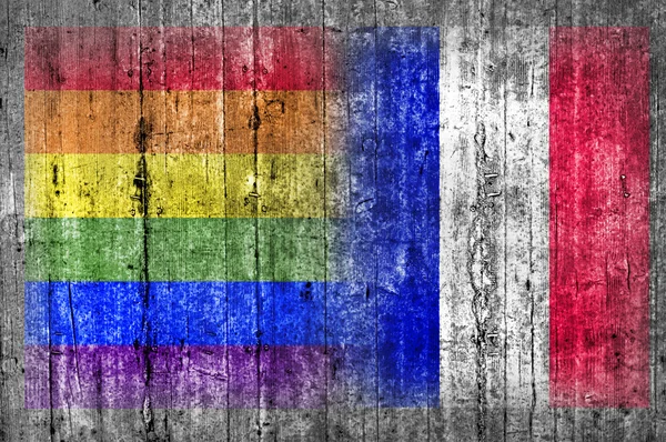 Bandeira LGBT e France na parede de concreto — Fotografia de Stock
