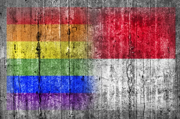 Bandera LGBT e Indonesia en muro de hormigón — Foto de Stock