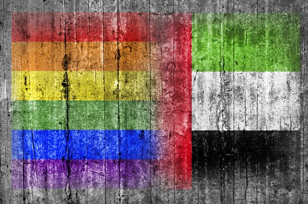 Σημαία του ΛΟΑΤ και Ηνωμένα Αραβικά Εμιράτα στο τσιμεντένιο τοίχο — Φωτογραφία Αρχείου