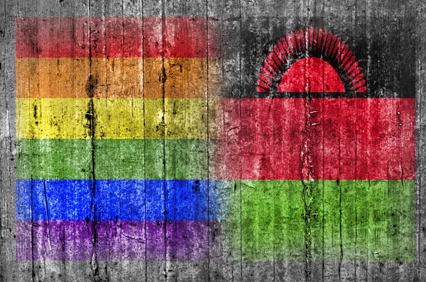 Bandiera LGBT e Malawi su muro di cemento — Foto Stock