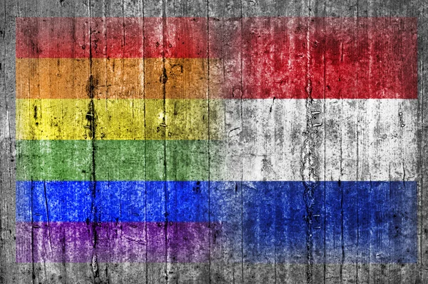 HBT och Nederländerna flagga på betongvägg — Stockfoto