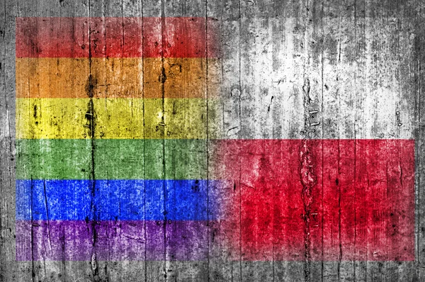 Bandera LGBT y Polonia en muro de hormigón — Foto de Stock