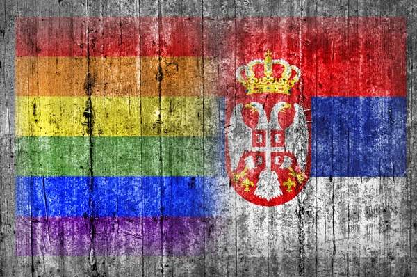 ЛГБТ і Сербія прапор на бетонну стіну — стокове фото