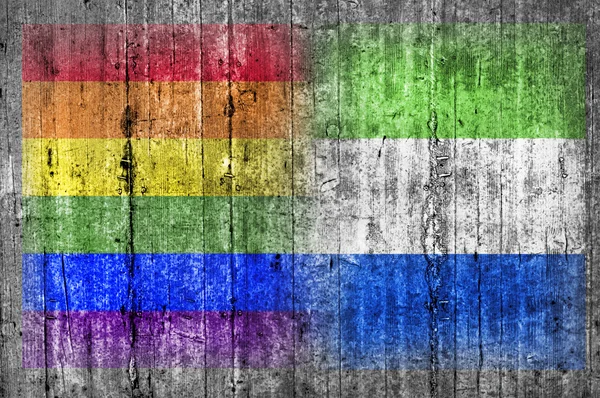 Flaga LGBT i Sierra Leone na betonowej ścianie — Zdjęcie stockowe