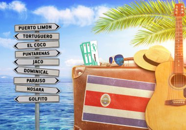 Concept of summer traveling with old suitcase and Costa Rica town sign with burning sun  clipart