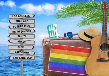Concept of summer traveling with old suitcase and LGBT flag clipart