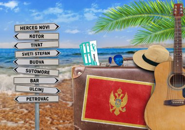 Concept of summer traveling with old suitcase and Montenegro town sign clipart