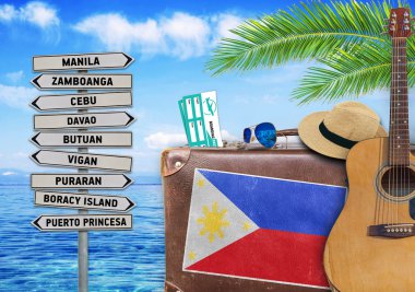 Concept of summer traveling with old suitcase and Philippines town sign clipart