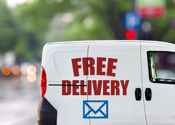 Consegna gratuita, furgone in strada — Foto Stock