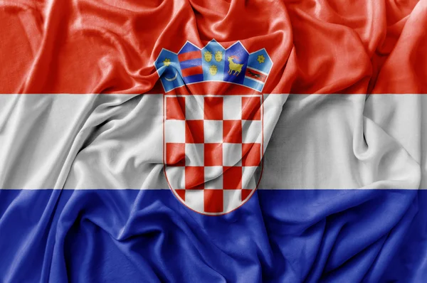 Gegolfde wuivende vlag van Kroatië — Stockfoto