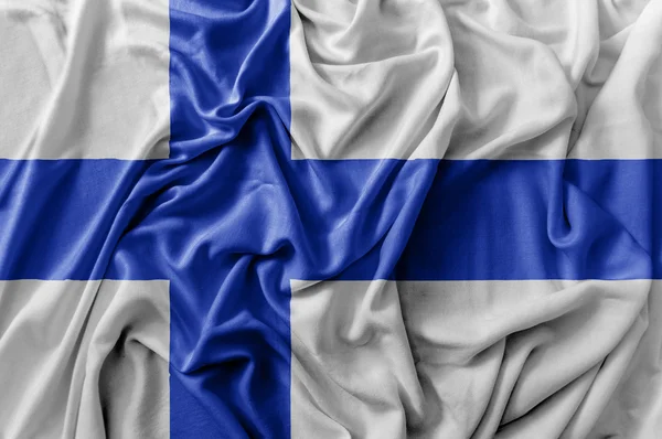 Ruffled ondeando bandera de Finlandia — Foto de Stock