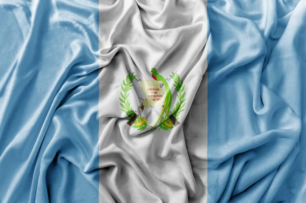 Gegolfde wuivende vlag van Guatemala — Stockfoto