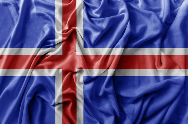 Rüschen schwenken isländische Flagge — Stockfoto