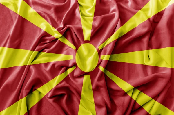 Ruffled acenando bandeira Macedónia — Fotografia de Stock