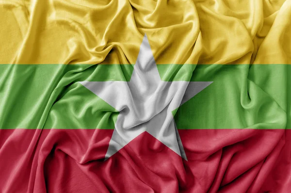 Ruffled ondeando la bandera de Myanmar — Foto de Stock