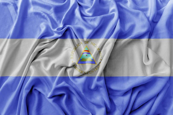 Ruffled waving Nicaragua flag — Stock Photo, Image