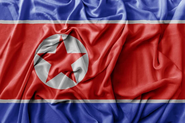 手を振る北朝鮮の旗をフリル — ストック写真