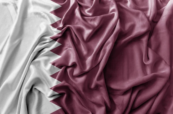 Gegolfde wuivende vlag van Qatar — Stockfoto