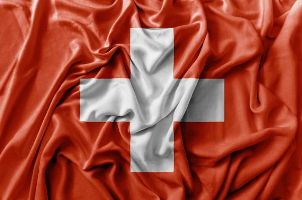 手を振っているスイスの国旗をフリル — ストック写真