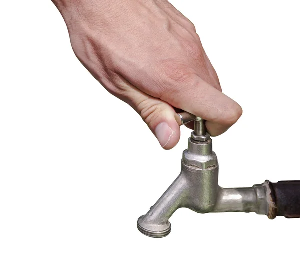 Gocciolamento d'acqua ad apertura manuale dal rubinetto isolato su bianco — Foto Stock
