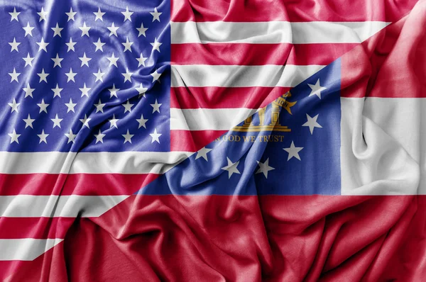 Zerzaust schwenken vereinigte staaten von amerika und georgien fahne — Stockfoto