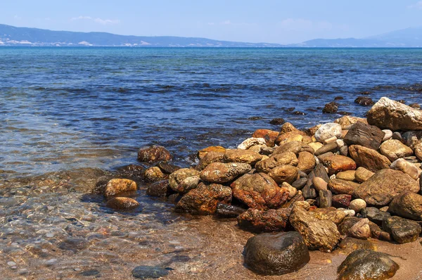 Playa de piedra y fondo de costa marina —  Fotos de Stock