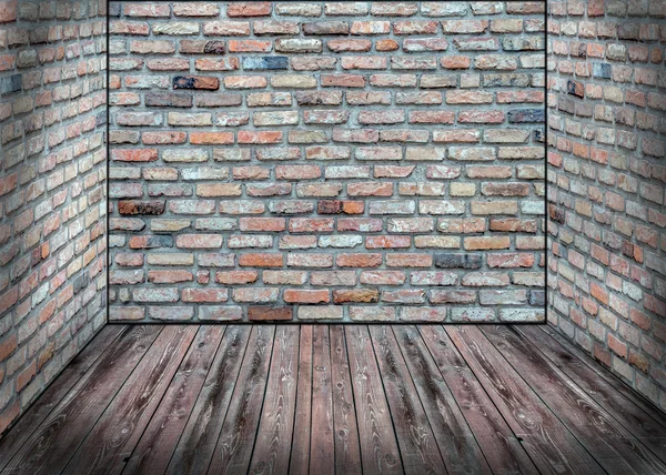 Abstract interior with old brick wall and wooden floor — Stock Photo, Image