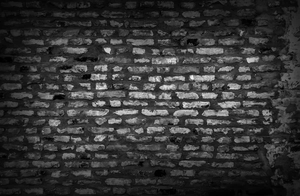 Black and white of old gundge brick wall