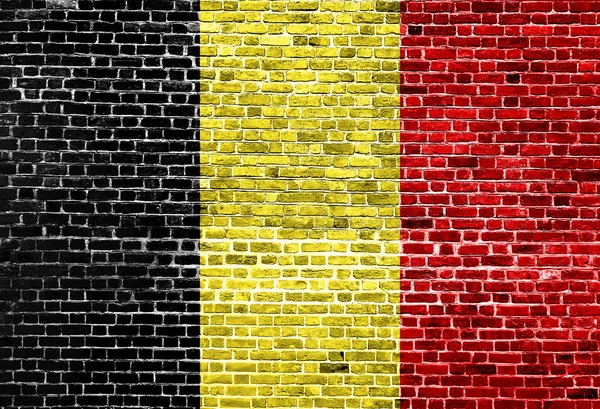 Bandera de Bélgica pintada sobre pared de ladrillo, textura de fondo — Foto de Stock