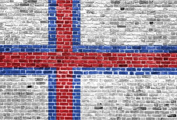 Bandera de las Islas Feroe pintada sobre pared de ladrillo, textura de fondo — Foto de Stock