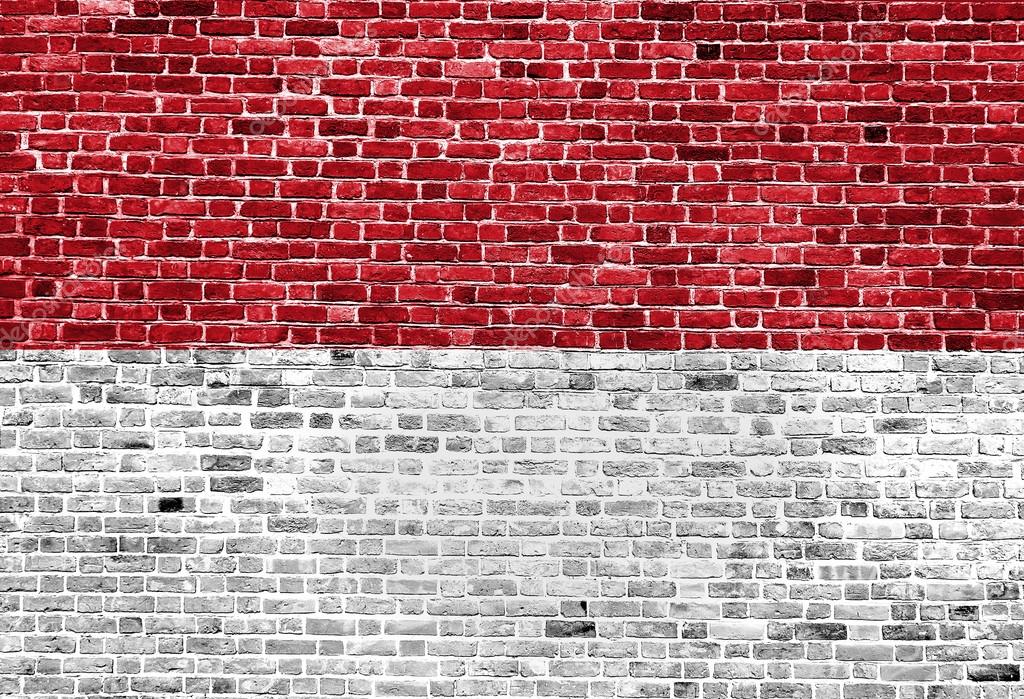 Flag of Indonesia painted on brick wall background  