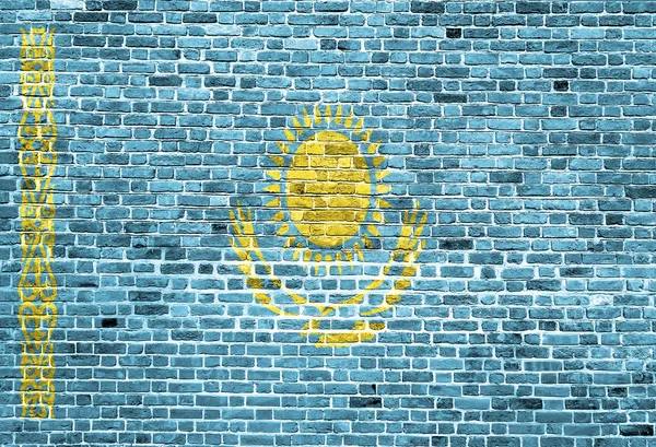 Bandera de Kazajstán pintada sobre pared de ladrillo, textura de fondo — Foto de Stock