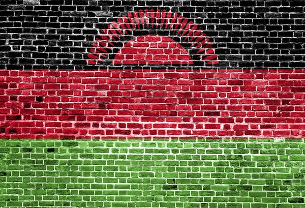 マラウイの国旗は、レンガの壁、背景テクスチャに描かれました。 — ストック写真