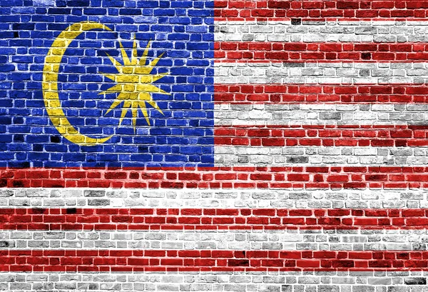 Flaga Malezji malowane na mur z cegły, tekstury tło — Zdjęcie stockowe
