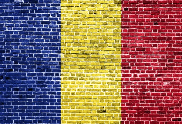 Flagge Rumäniens auf Ziegelwand gemalt, Hintergrundstruktur — Stockfoto