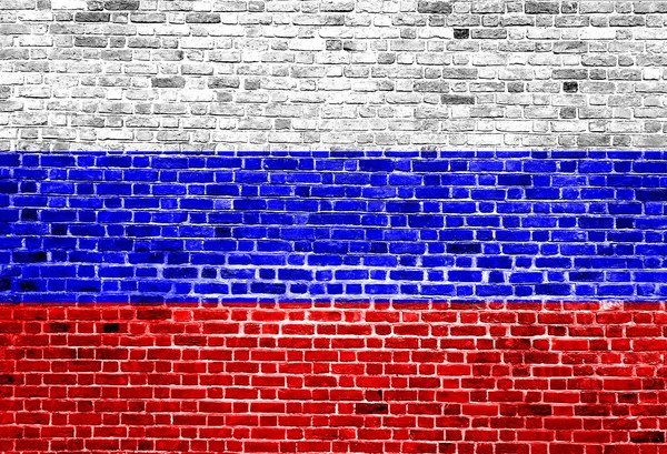 Bandeira da Rússia pintada na parede de tijolo, textura de fundo — Fotografia de Stock