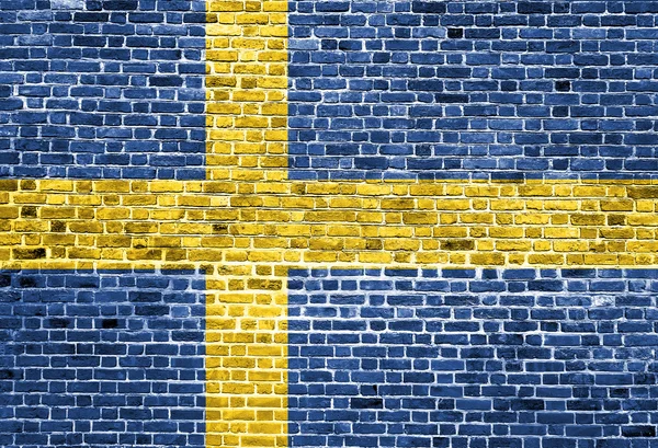 Flagga Sverige målade på tegelmur, bakgrundsstruktur — Stockfoto