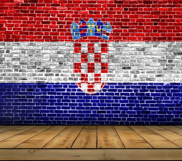 Croatia flag painted on brick wall with wooden floor — Stock Photo, Image